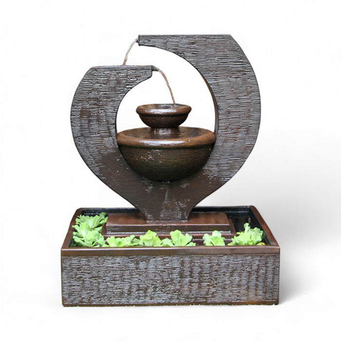 Decorative Exaco Eclipse Fountain in brown, featuring a two-tiered water feature perfect for a small tabletop or balcony with minimalist design and tranquil flowing water.
