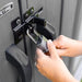 Close-up of a padlock securing the Lifetime dual entry storage shed's slider latch door handles.