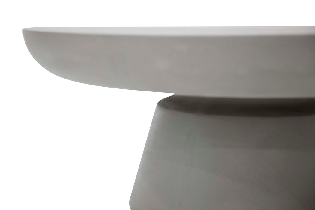 Close-up of the edge of Elementi Kylix Series small coffee table in space grey, emphasizing its smooth and modern curve.