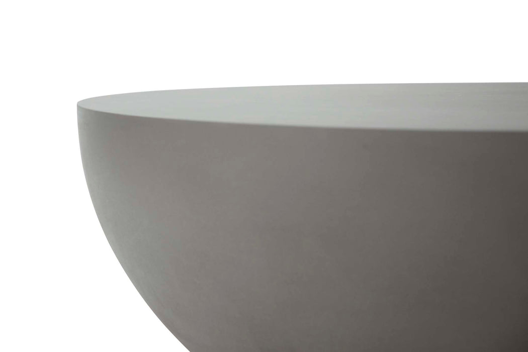 Close-up view of the smooth, curved edge of the Elementi Chronos Series large coffee table in space grey.