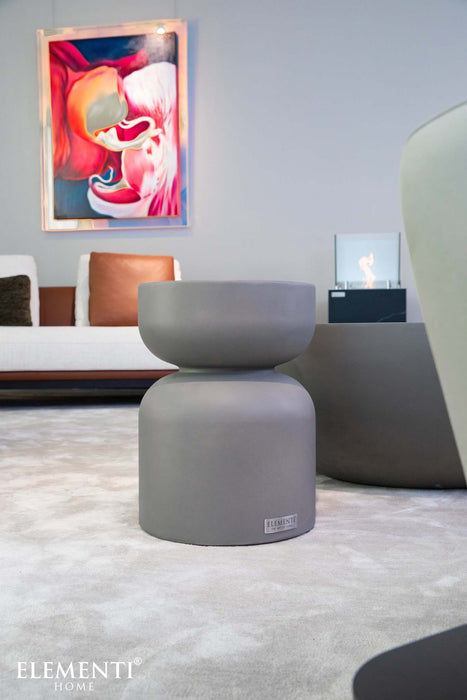 Elementi Chronos Series small side table in space grey, styled in a contemporary room setting with modern decor.