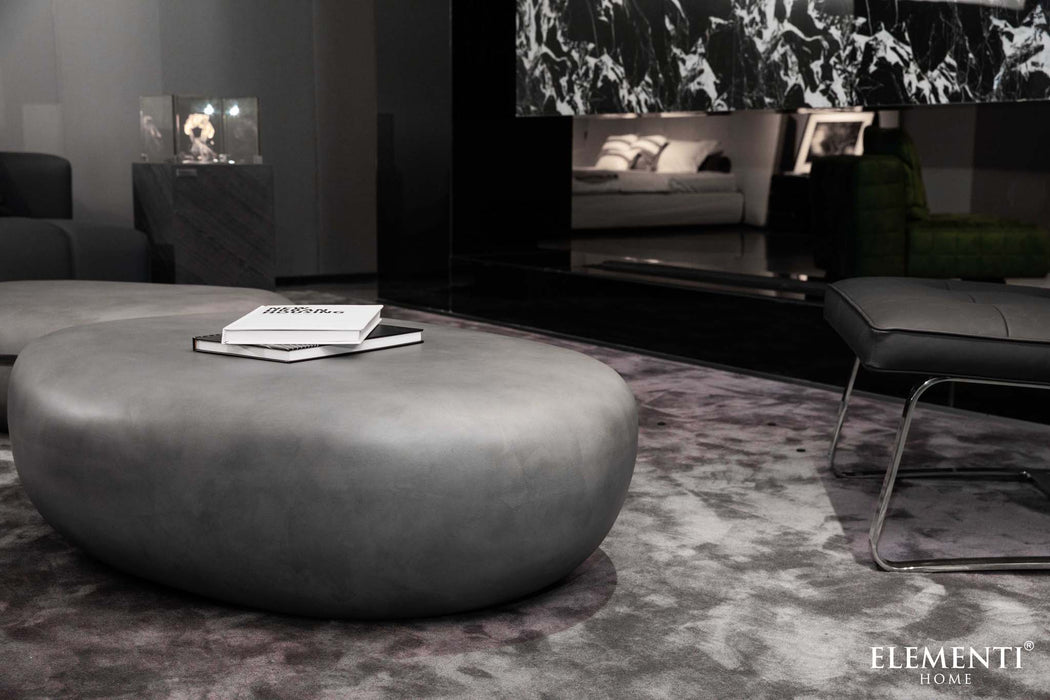 Elementi Hawaii Large Pebble Table in Moon Grey displayed in a modern lounge setting.