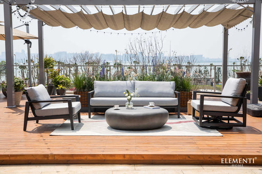 Complete view of the Elementi Laguna Collection in an outdoor setting, featuring comfortable seating options and a modern design aesthetic.