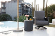  Elementi Rome Slate Black Side Table by the poolside, adding a touch of sophistication to the luxurious outdoor seating arrangement.