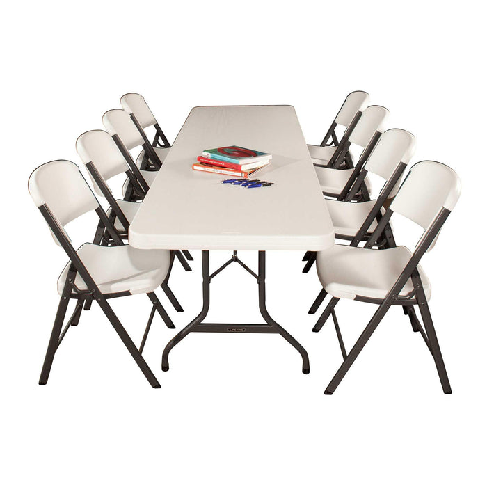 Event setup featuring Lifetime folding table surrounded by eight folding chairs, ideal for conferences, parties, and banquets.