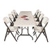 Event setup featuring Lifetime folding table surrounded by eight folding chairs, ideal for conferences, parties, and banquets.