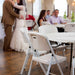 Lifetime 4 Pack White Classic Folding Chair used for indoor reception seating with round tables