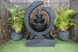 Compact Exaco Eclipse Fountain in black ceramic, featuring a cascading waterfall and a stylish three-tiered design ideal for small outdoor spaces or patios.