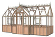 Angled view of the Alton cedar structure 7x16 Durham greenhouse, featuring its extended length and elegant Victorian architecture.