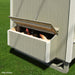 Open nesting boxes with hens visible from outside the 4x6 Colonial Gable chicken coop from Little Cottage Co.
