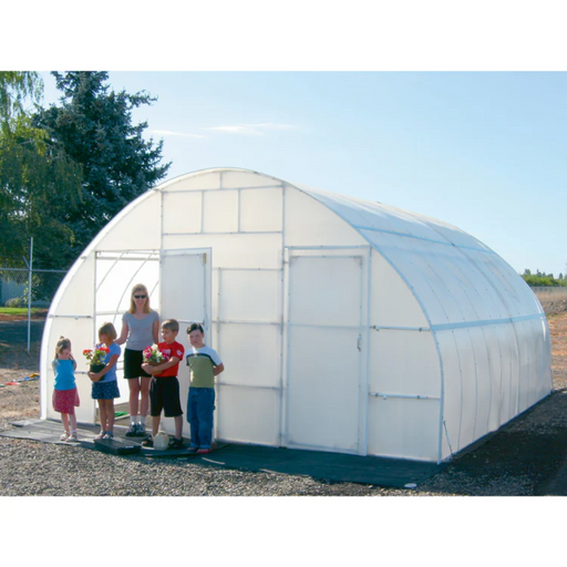 Family with children in front of a white Solexx Conservatory 16x16 deluxe greenhouse in a sunny outdoor setting