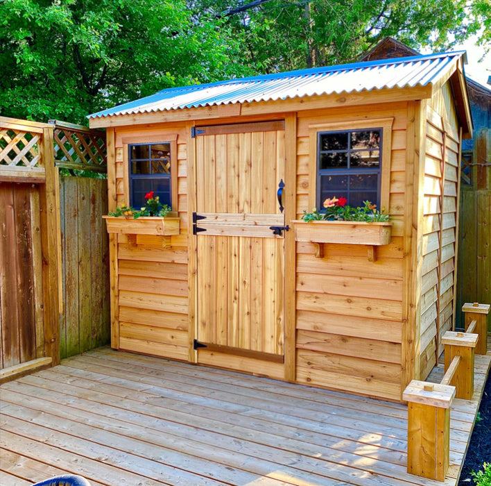 Cabana Garden Shed 9×6 with flowers outside