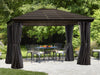Full view of a Venus Gazebo 10x10 with privacy curtains partially drawn back on a garden setting