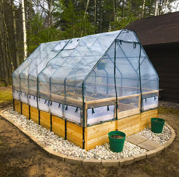 Outdoor Living Today Garden in a Box 8x12 with Greenhouse cover over a western red cedar raised bed on a stone-edged gravel pad by the woods