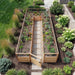 Aerial shot of the 8x16 Outdoor Living Today cedar garden bed, twin planting rows of corn, kale and tomatoes flanking a gravel stone path