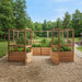 Outdoor Living Today Garden in a Box with Deer Fence 12x8 on gravel, cedar beds of lettuce, herbs and tomatoes with the gate swung open