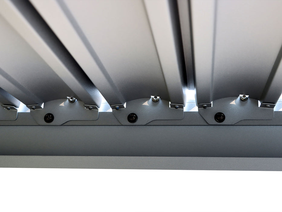 Close-up of the pergola's roof slat adjustment mechanism