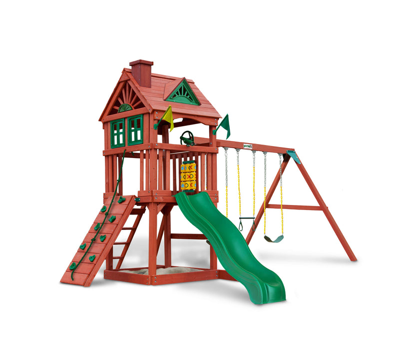 Gorilla Playsets Nantucket II swing set on white background showing two-story treehouse, green slide, rock wall, swing beam, and sandbox area