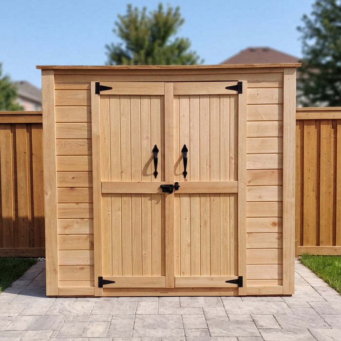 Close-up detail of the Grand Garden Chalet 6x3 shed's cedar siding, showing natural wood grain and paneling texture.