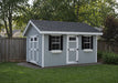Ez-Fit Kits Riverside Outdoor Garden Shed in gray with white-trimmed double and single doors, black shutters, window flower boxes, and gravel base