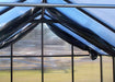 Interior view of Riverstone Greenhouse Internal Shade Cloth system attached to frame for sun protection