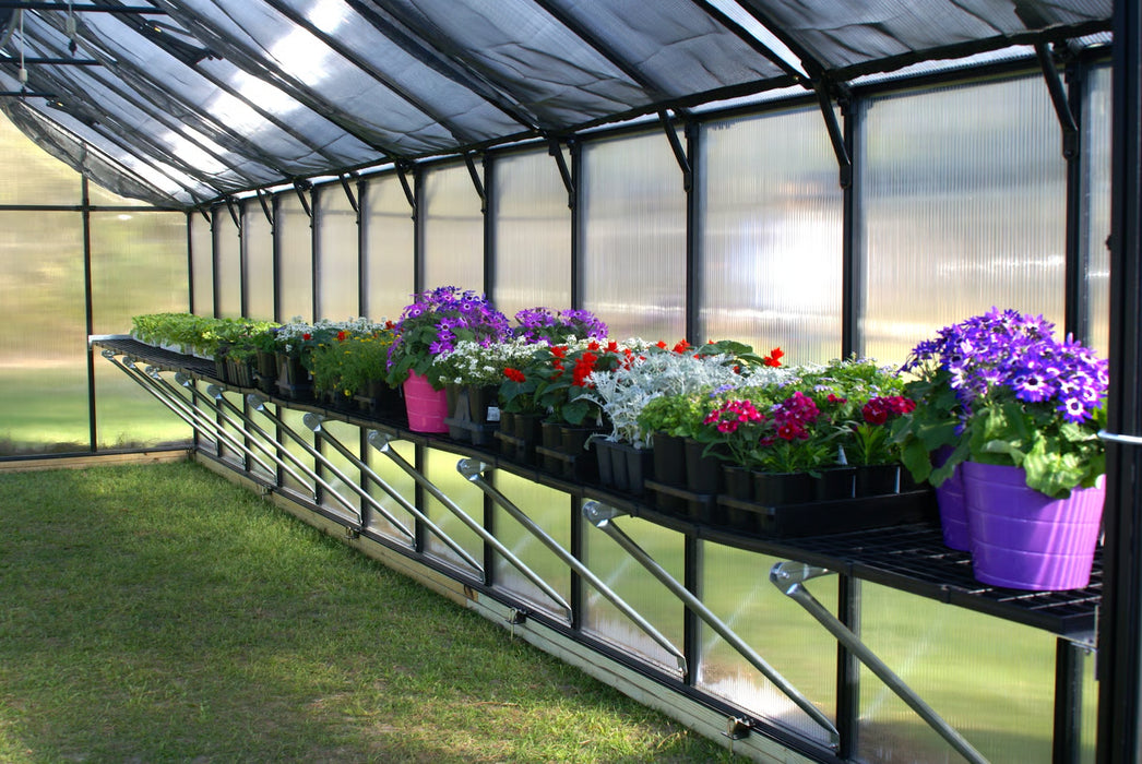 Riverstone Greenhouse Accessories Work Bench System in lifestyle setup with potted plants and gardening tools arranged neatly