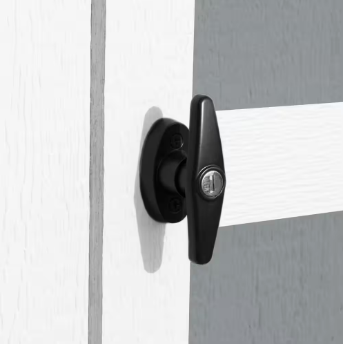 Close-up of the door handle and lock on the Handy Home Andover 8x12 wood storage shed.