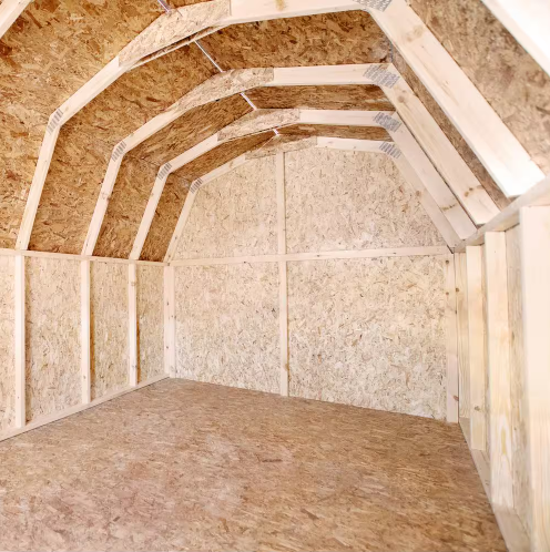 Back interior view of Handy Home Andover 8x12 wood storage shed showing the curved roof and walls.