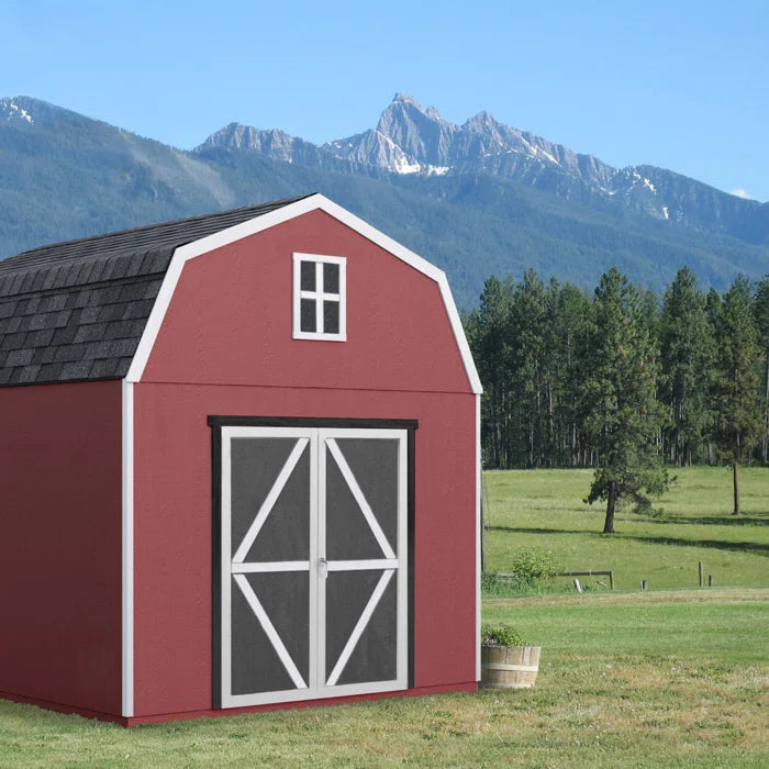 Handy Home Braymore wood storage shed in front of mountains.