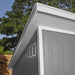 Handy Home Palisade shed exterior detail: gray wood-textured siding, white trim, and roof vent