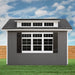 Handy Home Windemere shed with charming gray exterior, multiple windows, and dormer for ample natural light. Perfect storage or backyard workspace solution. 