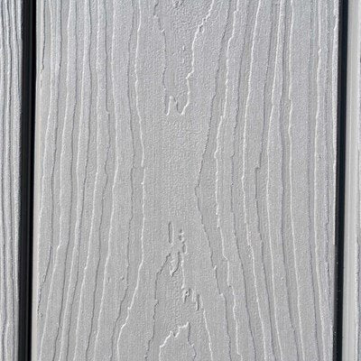 Close-up of the Lifetime 8x15 ft. storage shed's dual-wall HDPE panel texture.