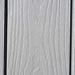 Close-up of the Lifetime 8x15 ft. storage shed's dual-wall HDPE panel texture.