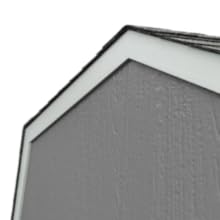 Detailed view of the roof and wall edge of the Handy Home Hudson storage shed.