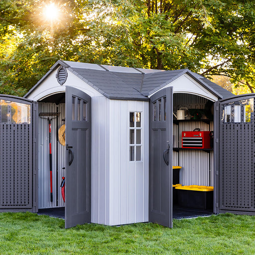 Inside the Lifetime 10x8 Dual Entry Storage Shed, showing a neatly organized tool storage area with shelves.