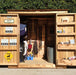 Horse riding equipment neatly organized inside the Outdoor Living Today Spacesaver 8x4 storage shed