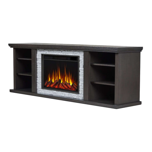 Real Flame Kenai electric fireplace TV stand in dark oak finish, angled side view showing open shelving on both sides and white stacked stone surround