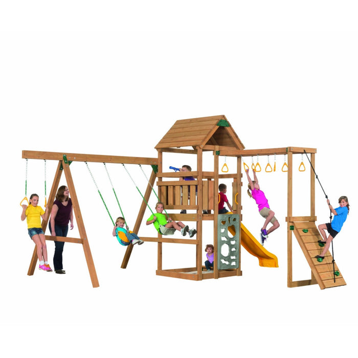 Children enjoying the Playstar Contender Starter playset, swinging, climbing, and sliding on a wooden outdoor fort designed for imaginative play.