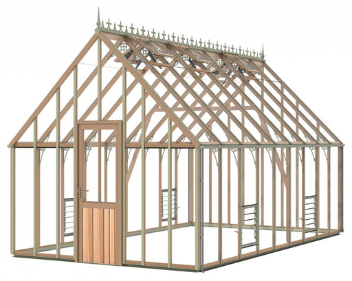 A 10x18 foot Lancing wooden greenhouse with a pitched roof and ornate cresting. The greenhouse has a central door and several smaller windows along the sides. The frame is made of dark wood, and the glass panes are clear.