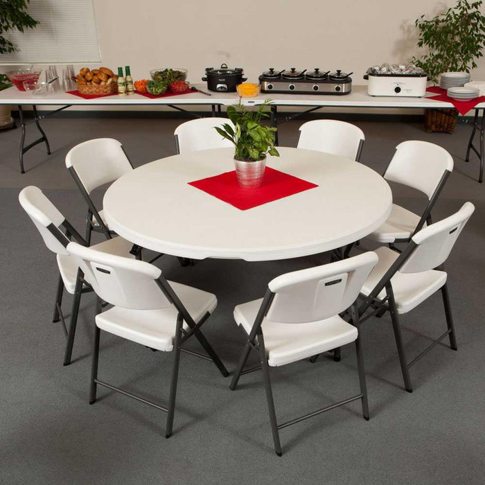 Lifetime 15 Pack 60in almond round folding table arranged with chairs for banquet and event seating
