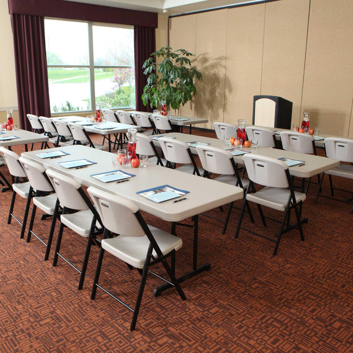Classroom setup using Lifetime 18 Pack Professional Folding Table 6 ft with folding chairs and meeting materials