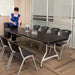 8-Foot Black Nesting Table from Lifetime 4 Pack used in conference room with chairs and drinkware on surface
