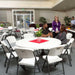 Lifetime 15 Pack 60in round folding tables arranged for event seating with full circle layout and chairs