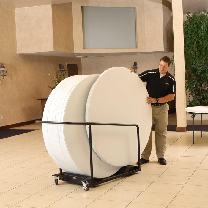 Lifetime almond 60in round folding tables being loaded onto storage cart from 15 Pack set