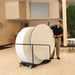 Lifetime almond 60in round folding tables being loaded onto storage cart from 15 Pack set