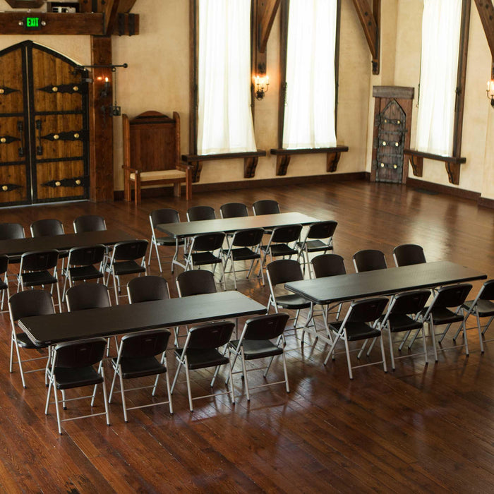 Event hall setup with Lifetime 8-Foot tables and folding chairs arranged in rows