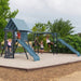 Lifetime Big Stuff Deluxe playset installed in a backyard with kids playing on the slides, monkey bars, and swings.