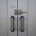 Close-up of the Lifetime-branded door handles and slider latch on the Modern Shed.