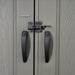 Close-up of the Lifetime-branded door handles and slider latch on the storage shed.