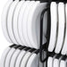 Close up of Lifetime chair cart side stack frame detail with white commercial folding chairs securely organized on steel rails